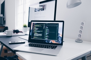 laptop and computer on desk